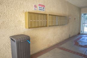 Canoga Park apartment for rent - a room with a radiator and a no smoking sign on the wall