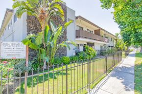 Winnetka apartment for rent - a house with a yard and a fence in front of it