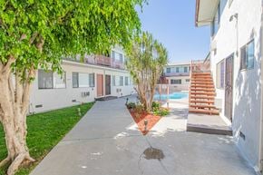 Reseda apartment for rent - the backyard of a house with a pool and stairs