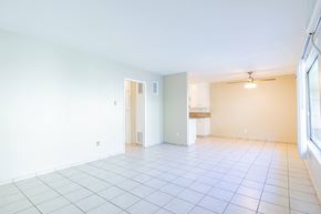 Winnetka apartment for rent - an empty living room with a tile floor