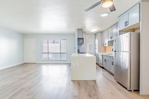 Santa Monica apartment for rent - a renovated kitchen with stainless steel appliances and white cabinets