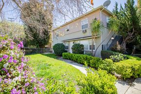 Valley Village apartment for rent - A house with a well-maintained garden in front.