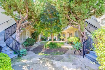 Valley Village apartment for rent - A house with a front yard and trees.
