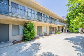 Valley Village apartment for rent - the courtyard of an apartment building with balconies and a driveway