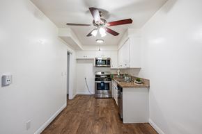 Sherman Oaks apartment for rent - A kitchen with a fan on the ceiling.