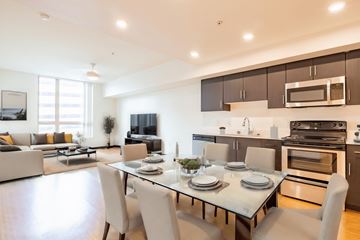 Tempe apartment for rent - a living room with a table and chairs and a kitchen