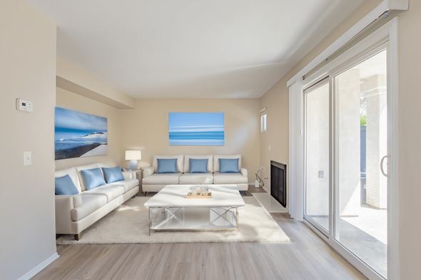 Oceanside apartment for rent - a living room with a couch and a coffee table