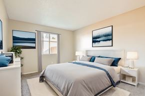 Moreno Valley apartment for rent - a bedroom with a bed and a window