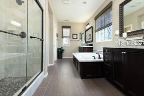 Buena Park apartment for rent - a bathroom with a shower and a sink and a bath tub