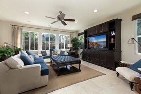 Buena Park apartment for rent - a living room filled with furniture and a large tv