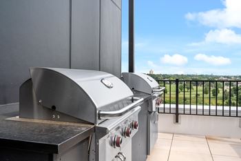 Rooftop deck with grills & skyline views
