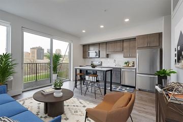 St. Paul apartment for rent - a living area with a kitchen and a table