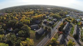 Eagan townhouse for rent - A suburban area with houses and trees.