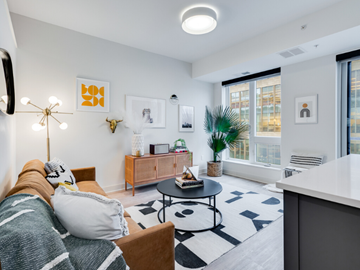 Minneapolis apartment for rent - a living room with a couch and a coffee table