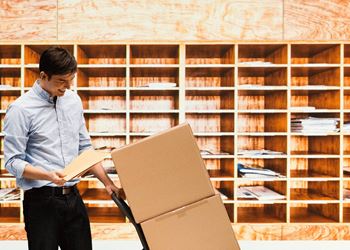 Mail/package room with refrigerator storage