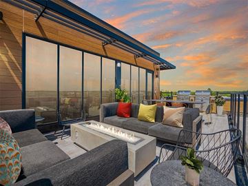 Minneapolis apartment for rent - a living area with couches and a table with a fire pit