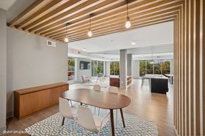 Minneapolis apartment for rent - A modern dining room with a round table and chairs.
