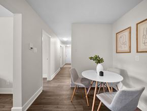 Orillia apartment for rent - a dining area with a round table and three chairs