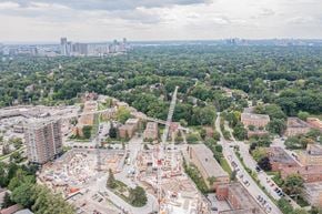 Toronto apartment for rent - a crane in the middle of a city