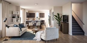 Reno townhouse for rent - A modern living room with a staircase leading to the upper floor at The Village at Hawk View, Reno, Nevada.