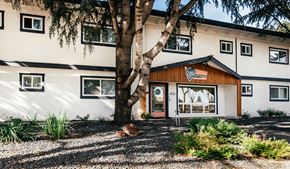 San Leandro apartment for rent - a building with a tree in front of it