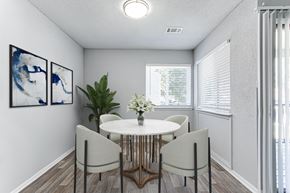 Austell apartment for rent - a dining room with a table and chairs