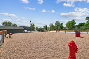 Northglenn apartment for rent - A red fire hydrant sits in the middle of a playground.