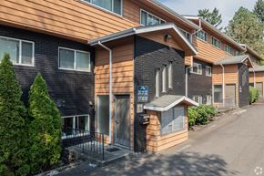 Beaverton apartment for rent - A building with a brown and black exterior and a sign that reads "2412 788".