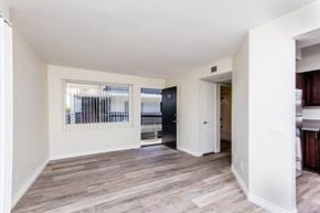 Culver City apartment for rent - a bedroom with hardwood flooring and white walls