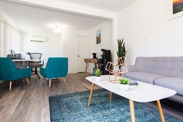 Fremont apartment for rent - a living room with a couch and two chairs and a table