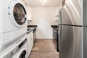 Fremont apartment for rent - a washer and dryer in a laundry room