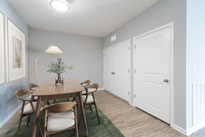 Knoxville apartment for rent - A dining room with a wooden table and chairs.