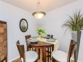 Chattanooga apartment for rent - A dining room with a round table set for four.