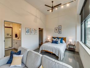 Knoxville apartment for rent - a bedroom with a bed and a couch