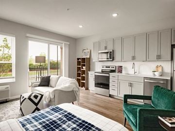 Richfield apartment for rent - a living room with a kitchen and a couch