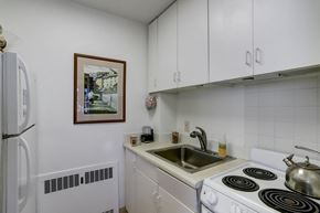 Boulder apartment for rent - a kitchen with a sink and a stove and a refrigerator