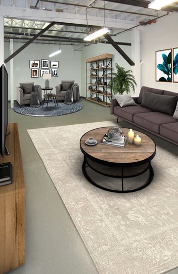 Oakland apartment for rent - A living room with a grey couch and a coffee table.