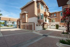 Ventura apartment for rent - A large house with a driveway and garage.