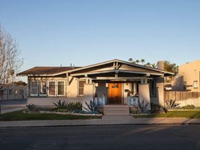 Ventura apartment for rent - A house with a brown door and a small front yard.