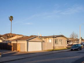 Ventura apartment for rent - A house with a car parked in front of it.