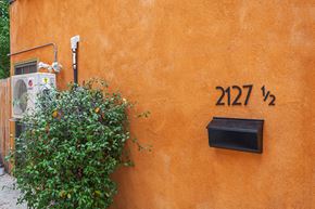 Los Angeles apartment for rent - A wall with the number 2127 on it.