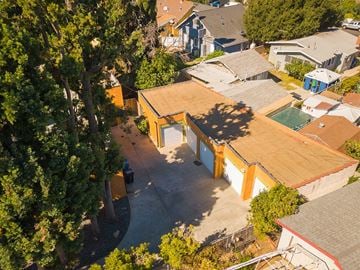 Los Angeles apartment for rent - A backyard with a pool and a tree.