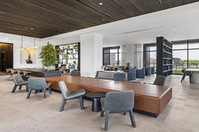 Chicago apartment for rent - a conference room with a large wooden table and chairs
