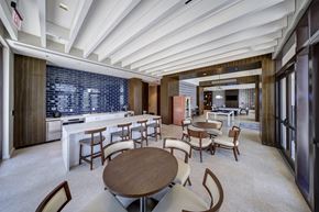 Coral Gables apartment for rent - a dining room with tables and chairs and a bar
