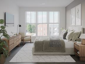 Lancaster apartment for rent - a bedroom with a bed and a large window