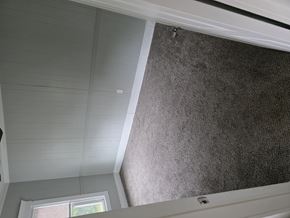Smithfield apartment for rent - A room with a grey wall and a window.