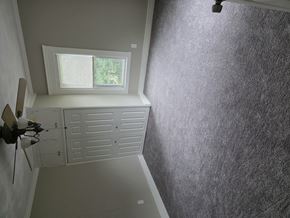 Smithfield apartment for rent - A room with a window and a ceiling fan.