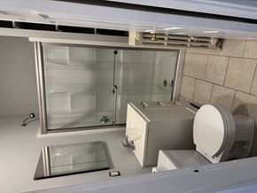 Jamaica Plain apartment for rent - A modern bathroom with a glass shower door and a toilet.