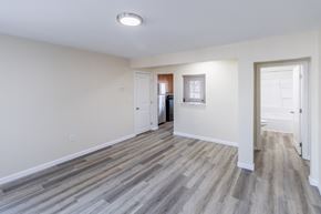 Middletown apartment for rent - A room with a light grey floor and white walls.
