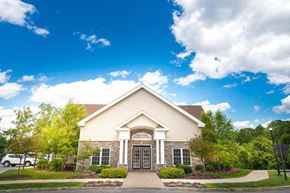 Newburgh apartment for rent - a large white house with a blue sky